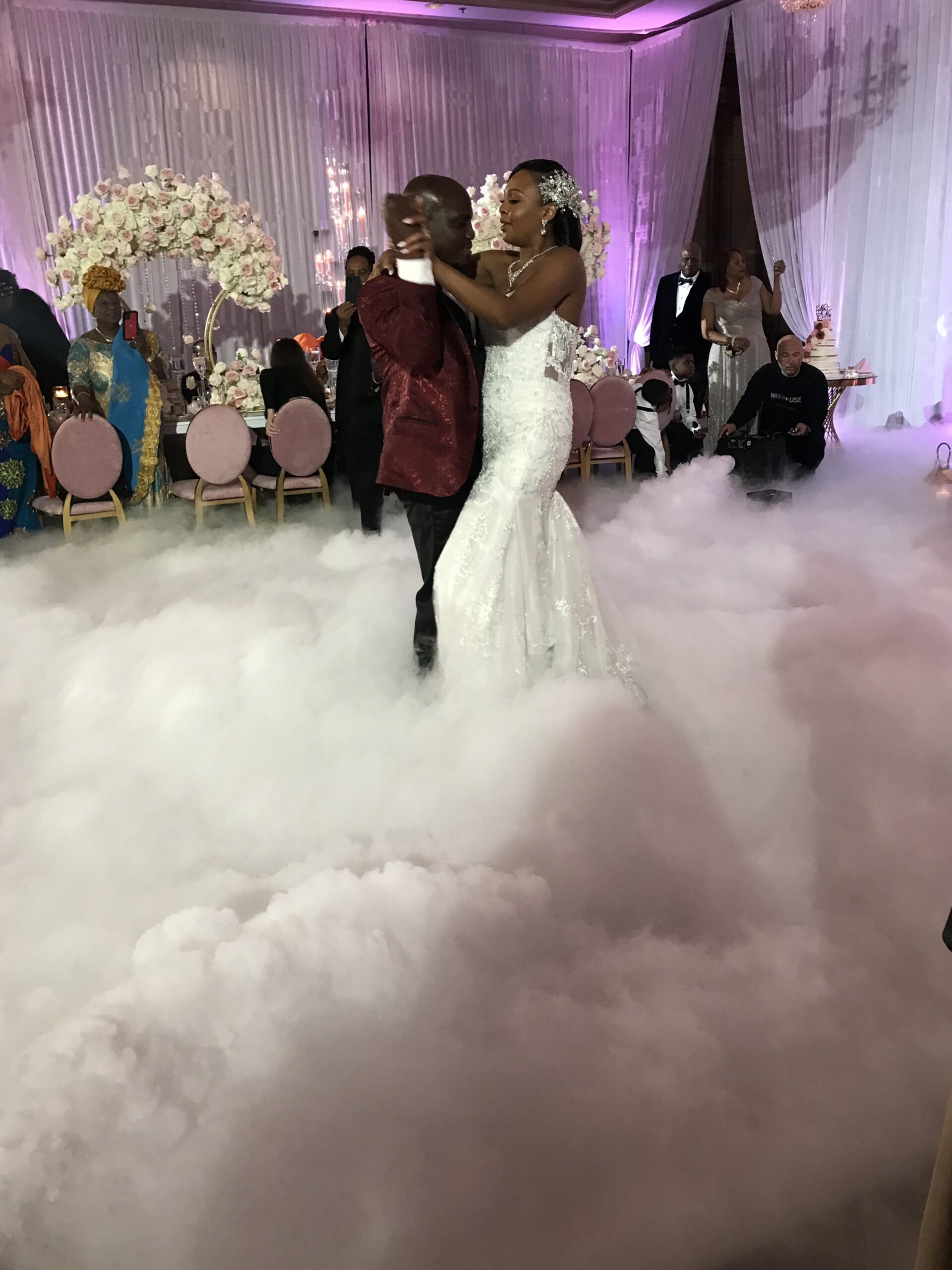 Event space showcasing low-lying fog effect, enhancing decorations and lighting for a captivating ambiance.